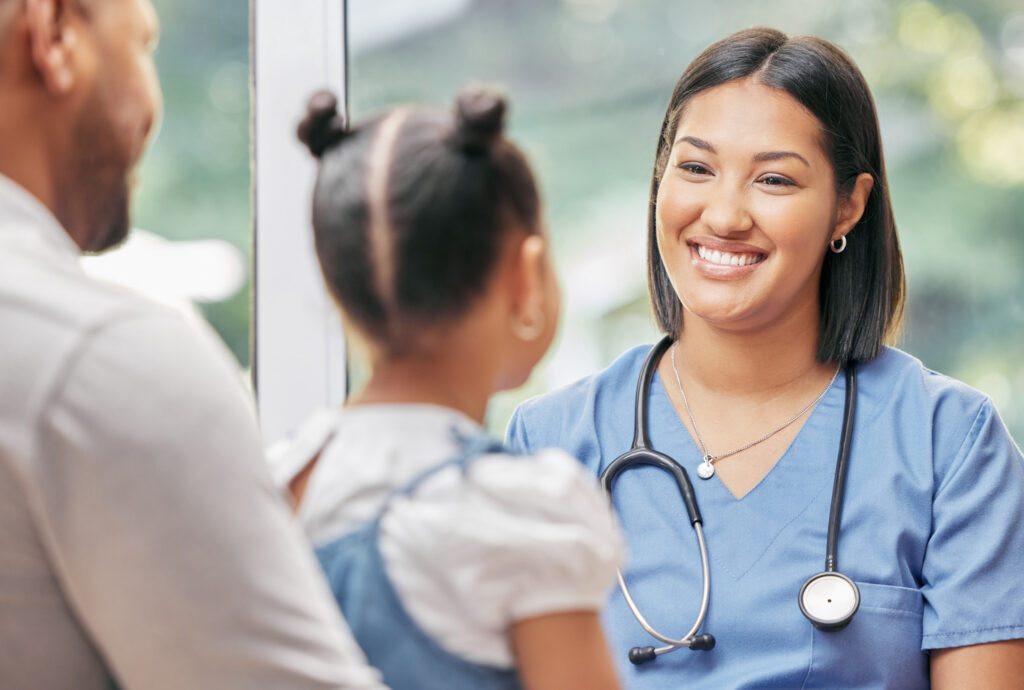 Father, child and nurse talking about Medicare reimbursement rates and smiling